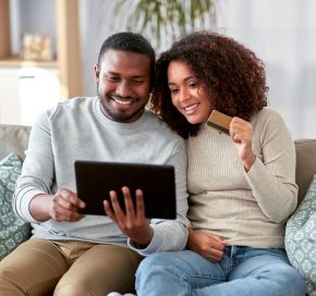 Couple using online chatbot to help with purchase